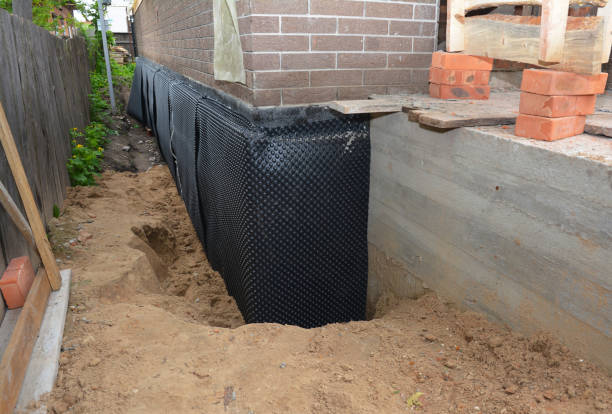 SJ Waterproofing Pros technician performing targeted Foundation Crack Repair assessment in Fremont, OH